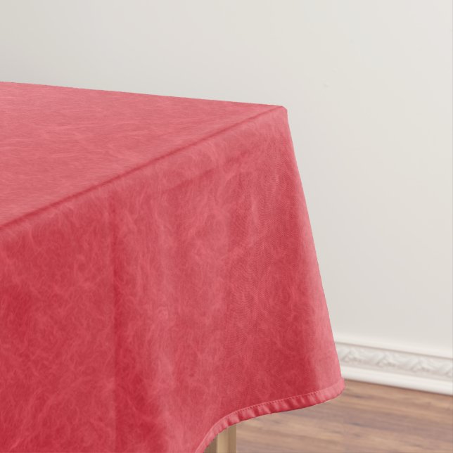 Red textured surface with subtle swirling pattern tablecloth (In Situ)