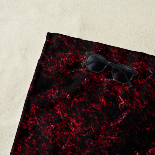 Red thick sponge upon dark red background beach towel