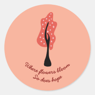 Red tree in blossom with pink flowers and quote classic round sticker