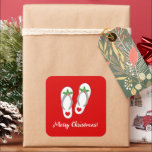 Red tropical Christmas holly leaf beach flip flops Square Sticker<br><div class="desc">Red tropical Christmas holly leaf beach flip flops Square Sticker. Funny beach sandals design for winter Holiday season in warm location. Cute slippers with hearts. Customizable background colour and text template. Stylish script typography template. Great for Christmas in July,  Hawaii,  California,  Florida and other sunny places.</div>