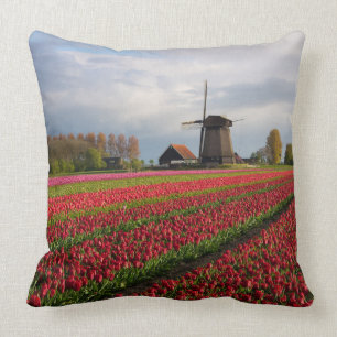 Red tulips and a windmill throw pillow