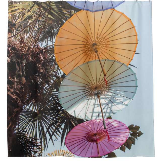Red umbrella on green tree (Front)