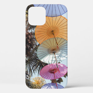 Red umbrella on green tree iPhone 12 case