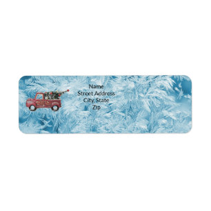 red vintage truck on a blue snowflake background
