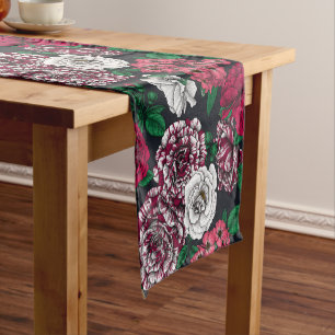 Red, white and bi-colour roses with green leaves o short table runner