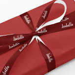 Red & White Personalized Christmas Gift Satin Ribbon<br><div class="desc">Looking for the perfect finishing touch to add to your Christmas gifts this holiday season? Look no further than our customizable Christmas gift ribbon! Featuring a deep festive red background and personalized name in white script, this ribbon will add a touch of elegance and sophistication to any gift. Whether you're...</div>