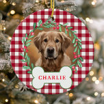 Red & White Plaid Dog Photo Christmas Wreath Ceramic Ornament<br><div class="desc">Add a rustic touch to your holiday decor with this personalized red and white buffalo plaid dog photo Christmas wreath ornament. Featuring a festive wreath with green leaves and berries surrounding your pet's photo, this ornament is perfect for dog lovers who want to showcase their furry friends on their Christmas...</div>