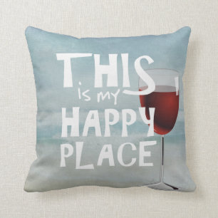 red wine with ocean background throw pillow