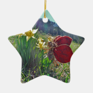 red wing fairy and daffodils ceramic ornament