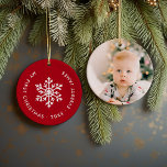 Red Winter Snowflake First Christmas Keepsake Ceramic Ornament<br><div class="desc">Ceramic holiday ornament personalized with your baby's photo and custom "My First Christmas" text. This simple modern holiday design features a white snowflake on a festive red background. Use the design tools to choose any background colour, edit text fonts and colours and add your own photos to create your own...</div>