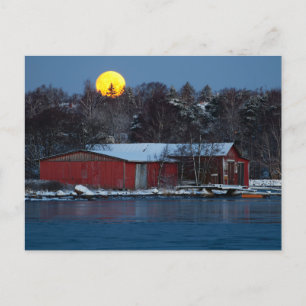 Red wooden boathouse in Helsinki, Finland postcard