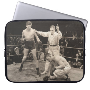 Referee counting over boxer in ringboxing, vintage laptop sleeve