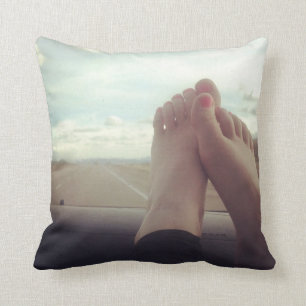 relax feet on the dashboard throw pillow
