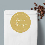 Relax Script Love is Brewing Custom Colour Wedding Classic Round Sticker<br><div class="desc">Wedding sticker featuring the words "Love is Brewing" in a relax cursive script in white against an editable background colour (click customize to access). Personalize it by replacing the placeholder text. For more options such as to change the font and it's size/colour, expand /contract curve or the spacing between letters...</div>