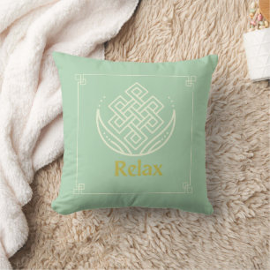 Relaxation Haven Throw Pillow on green background