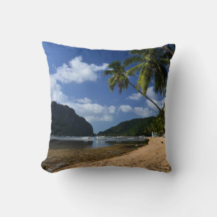 Relaxing on a heavenly beach in El Nido Throw Pillow