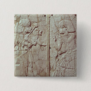 Relief depicting a guard holding 2 inch square button
