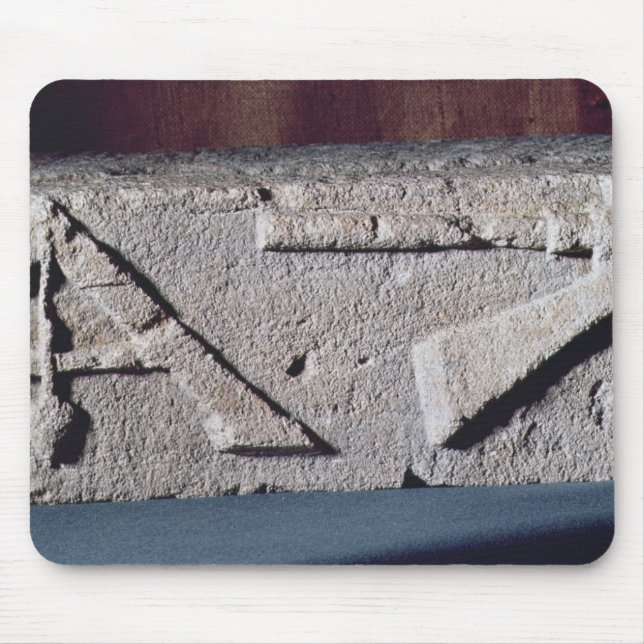 Relief depicting a stonemason's instrument mouse pad (Front)