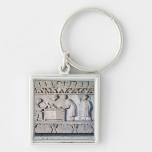 Relief depicting a tax collecting scene keychain