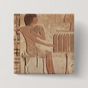 Relief depicting the deceased seated 2 inch square button