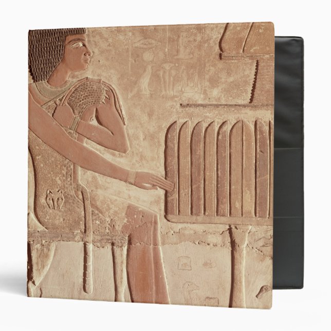 Relief depicting the deceased seated binder (Front/Inside)