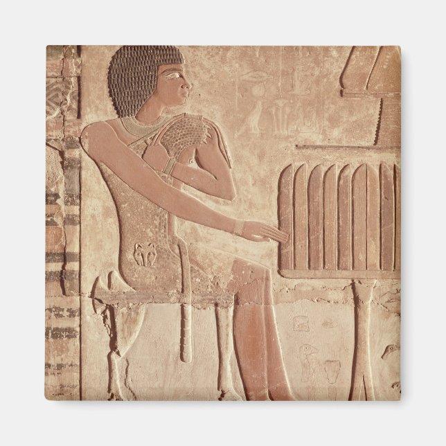 Relief depicting the deceased seated magnet (Front)