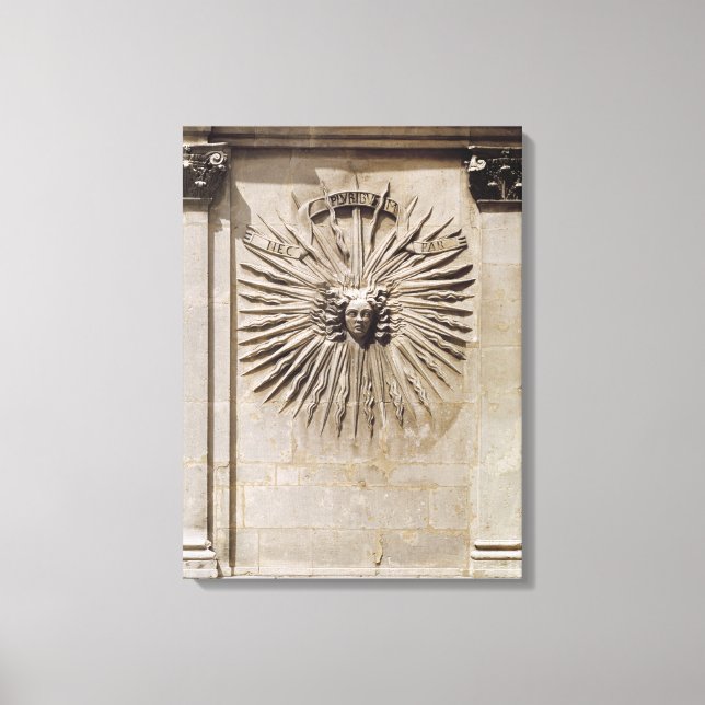 Relief of the sun from the facade canvas print (Front)