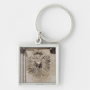 Relief of the sun from the facade keychain