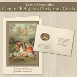 Religious Christmas Jesus Virgin Mary St Joseph  Holiday Card<br><div class="desc">This lovely Christmas card features a beautiful personalized Christmas traditional Catholic religious vintage print of Virgin Mary,  St. Joseph and angels gazing upon the Christ Child as He lie in the manger.  All text and fonts may be modified.</div>