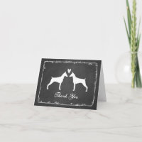 Pinschers de dobermann épousant le carte de
