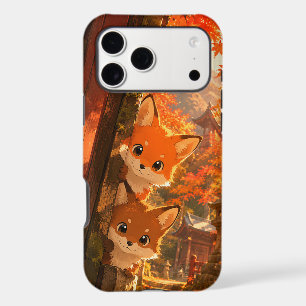 Renards mignons qui regardent feuilles d'érable de