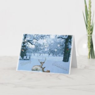 Renne dans la carte de neige