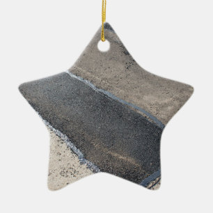 Repair pavement and laying new asphalt ceramic ornament