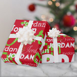 Repeating Name Pattern Green White Red Christmas Wrapping Paper<br><div class="desc">This modern repeating name green and white graffiti pattern personalized Christmas wrapping paper features their name or family name in a repeating word pattern with different trendy fonts on a Christmas red background. Your recipient will love to see their name gracing the front of their gifts! Order a roll for...</div>