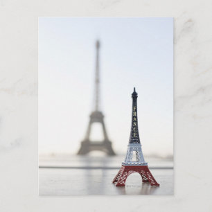 Replica of Eiffel Tower with original one in the Postcard