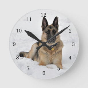 Rescue German Shepherd Dog in Snow Round Clock