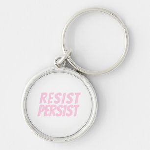 "resist persist" light pink white keychain