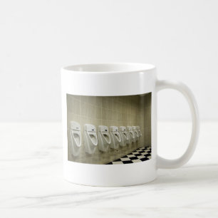 restroom interior with urinal row coffee mug