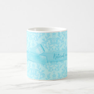 "Retired and loving it" damask pale blue mug