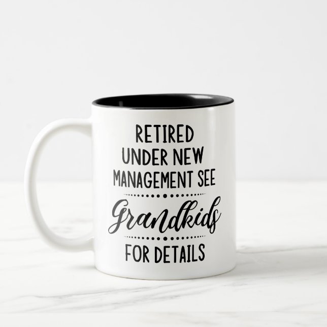 Retired Under New Management See Grandkids Two-Tone Coffee Mug (Left)