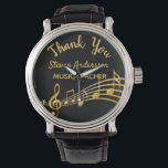 Retirement gold music notes black music teacher watch<br><div class="desc">Simple and elegant retirement gift for a male or female music teacher! A classic black coloured background with faux gold music notes. Template for a name,  and the thext: Thank You,  golden letters.   Thank you is written with a modern hand lettered style script.</div>