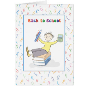 Retour à l'école garçon avec livres et crayons