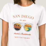 Retro Beach Bachelorette Party Girls Trip Custom T-Shirt<br><div class="desc">Make a splash at your upcoming bachelorette party with this stunning beach bachelorette party personalized t-shirts. Whether you're celebrating a bach trip, a girls' vacation, or a best friends' holiday, this custom beach bachelorette party t-shirts are the perfect addition to your unforgettable getaway. Add a personal touch to your bachelorette...</div>