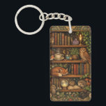 Retro book lover woodland animals keychain<br><div class="desc">A cozy retro-inspired design featuring a charming bookshelf filled with vintage books,  delicate botanical accents,  cute woodland animals and a comforting cup of tea or coffee.</div>