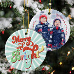 Retro Christmas Photo Personalized Ceramic Ornament<br><div class="desc">Add a touch of nostalgia to your holiday decor with this retro style Christmas decoration ornament! Featuring bold, colourful lettering design and a playful "Merry & Bright" seasonal message, this vintage-inspired tree accessory is perfect for spreading holiday cheer. The striped blue pattern and festive multicolor holiday charm bring a whimsical...</div>