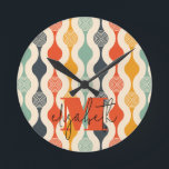 Retro Groovy Pattern Round Clock<br><div class="desc">Your monogram and first name highlight a retro mod circle pattern in a groovy colour palette,  this wall clock is fun for you,  your kids,  and college dorm rooms or give as a gift. (You can remove the monogram and first name,  just leave the personalization blank.)</div>