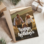 Retro Happy Holidays Christmas Vertical Photo Holiday Card<br><div class="desc">This Retro Happy Holidays Christmas Vertical Photo Holiday Card offers a clean and sophisticated design with a full family photo and large "Happy Holidays" retro script typography. The casual,  yet retro style blends effortlessly with the natural setting,  making it a perfect option for families seeking a timeless holiday greeting.</div>
