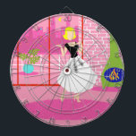 Retro In the Pink Dart Board<br><div class="desc">This Retro In the Pink Dart Board looks like a scene out of a 1960's romantic comedy. The minimalist design shows a sophisticated woman in her ultra kitschy and ultra pink, penthouse apartment. The room features a pink brick wall with white grout lines. In front of the wall, there is...</div>