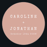 Retro Minimalist Dusty Rose Typewriter Wedding Classic Round Sticker<br><div class="desc">Add a vintage charm to your wedding favours with this Retro Minimalist Typewriter Font Custom Wedding Classic Round Sticker! The soft dusty rose background beautifully complements the simple white typography in a classic typewriter font, creating a timeless and elegant design. Perfect for sealing envelopes, decorating favours, or adding a personal...</div>