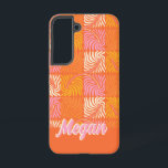 Retro Orange Pink Groovy Psychedelic Personalized Samsung Galaxy Case<br><div class="desc">Introducing the "Retro Orange Pink Groovy Psychedelic Personalized Samsung Galaxy S22 Case" a captivating fusion of nostalgic charm and modern functionality. This eye-catching Samsung case features a vibrant and bold design inspired by the groovy and psychedelic patterns of the retro era, making it the perfect accessory for those who appreciate...</div>